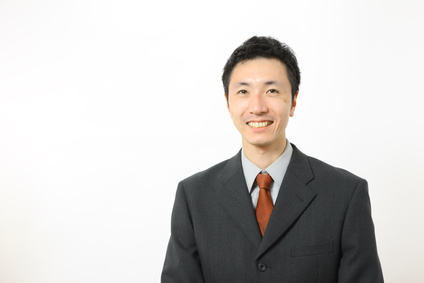 Japanese businessman smiles